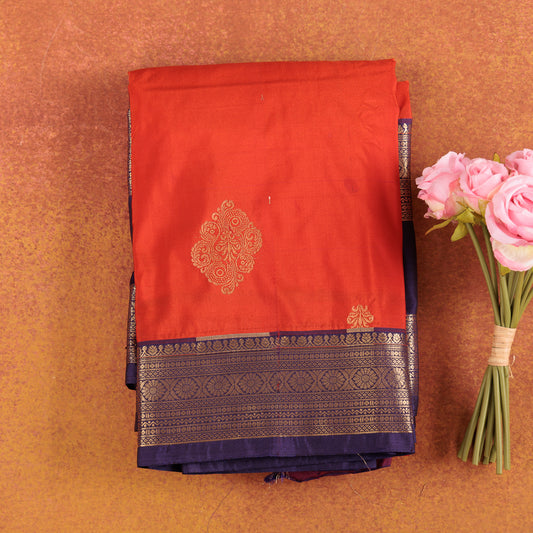 Orange-kanjivaram-silk-saree-with-navy-blue-zari-contrast-border.