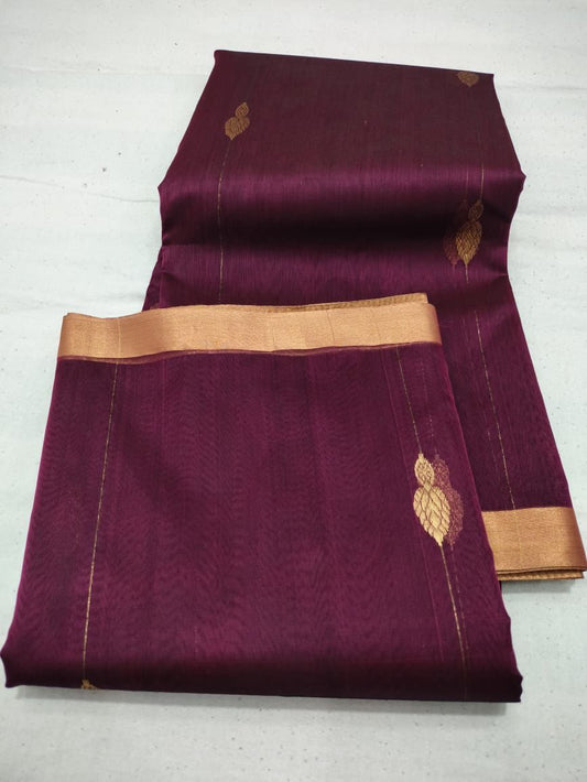 “Wine purple Chanderi saree with gold buti motifs and gold zari border, neatly folded on white background.”