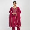 “Deep pink women’s stitched kurta with intricate gold embroidery on neckline and front, neatly folded and displayed.”