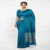 Model wearing Teal Blue Matka Silk Saree - No Border