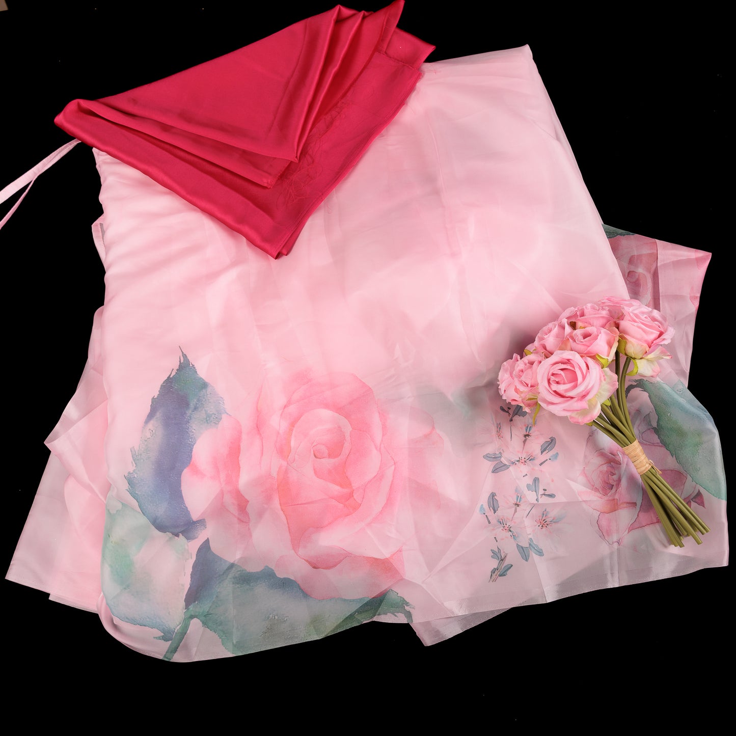 Soft-pink-organza-saree-with-large-rose-floral-print-and-magenta-contrast-blouse.