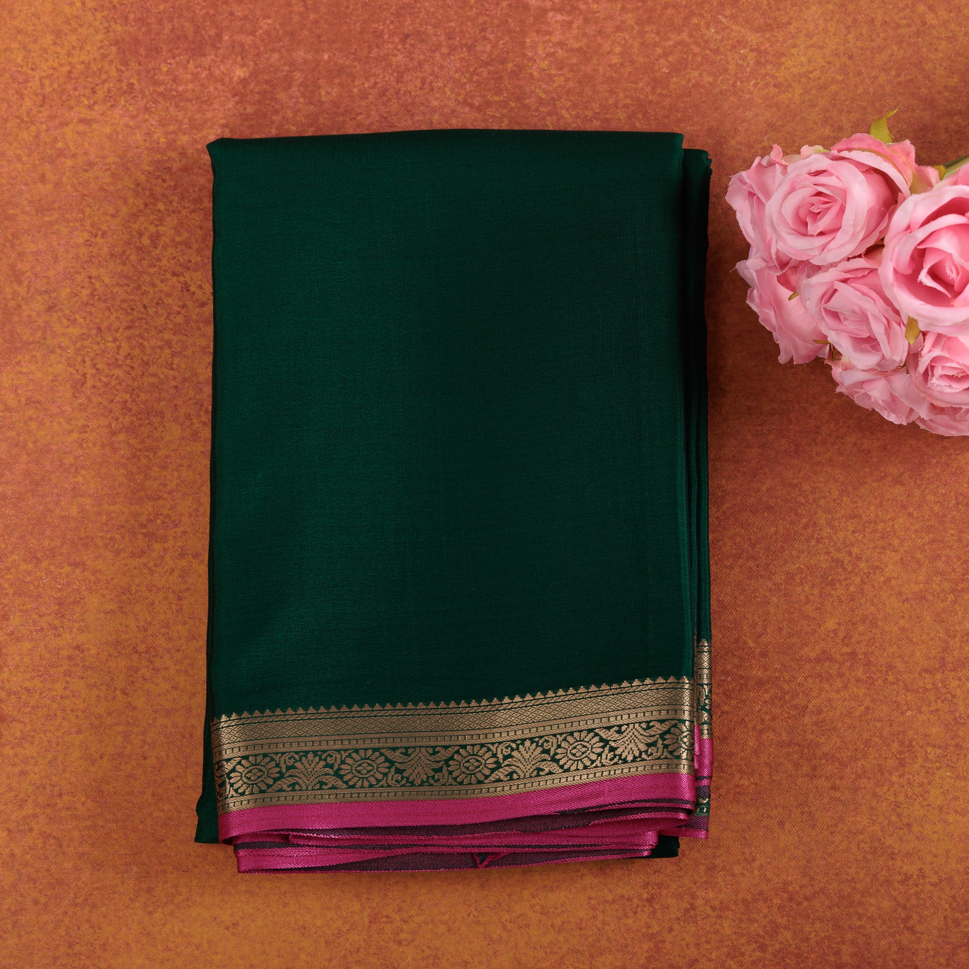 Forest-green-pure-mysore-silk-saree-with-antique-zari-and-pink-piping.