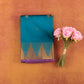 Teal-blue-kanjivaram-semi-silk-saree-with-pink-contrast-temple-zari-border.