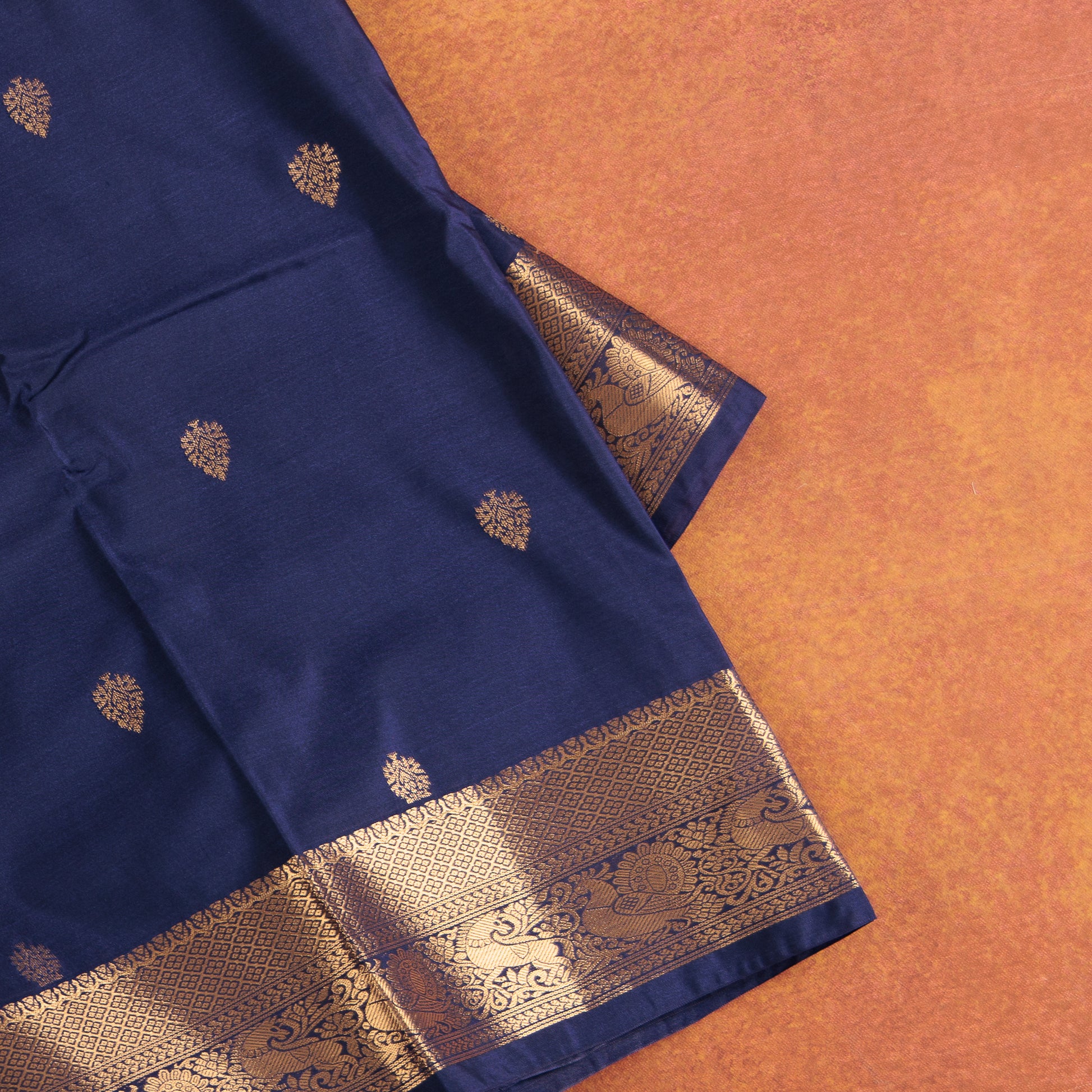 Royal blue Kanjivaram silk saree with traditional golden border design