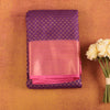 Lavender-kanjivaram-semi-silk-saree-with-pink-contrast-border-and-silver-elephant-motifs.