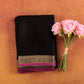 Elegant-black-mysore-silk-saree-with-dull-gold-zari-border-and-pink-contrast-piping.
