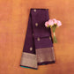 Deep-maroon-pure-kanjivaram-silk-saree-with-wide-gold-zari-border-and-roses.