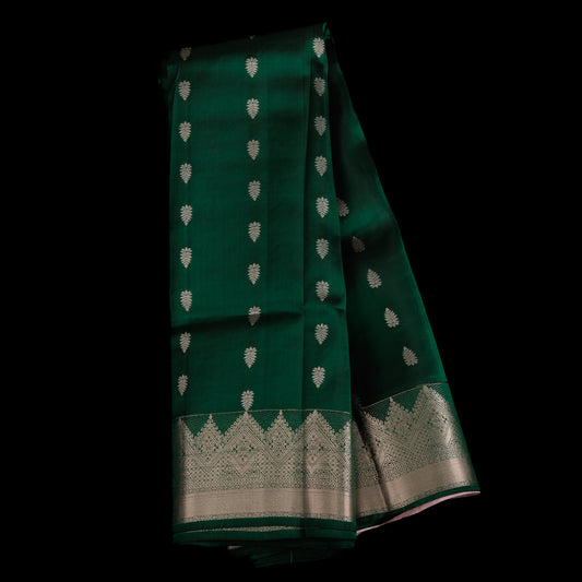 emerald-green-kanjivaram-silk-saree-silver-zari-border-traditional-wedding-wear