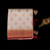 White and red tissue saree with golden buti work and zari border for women