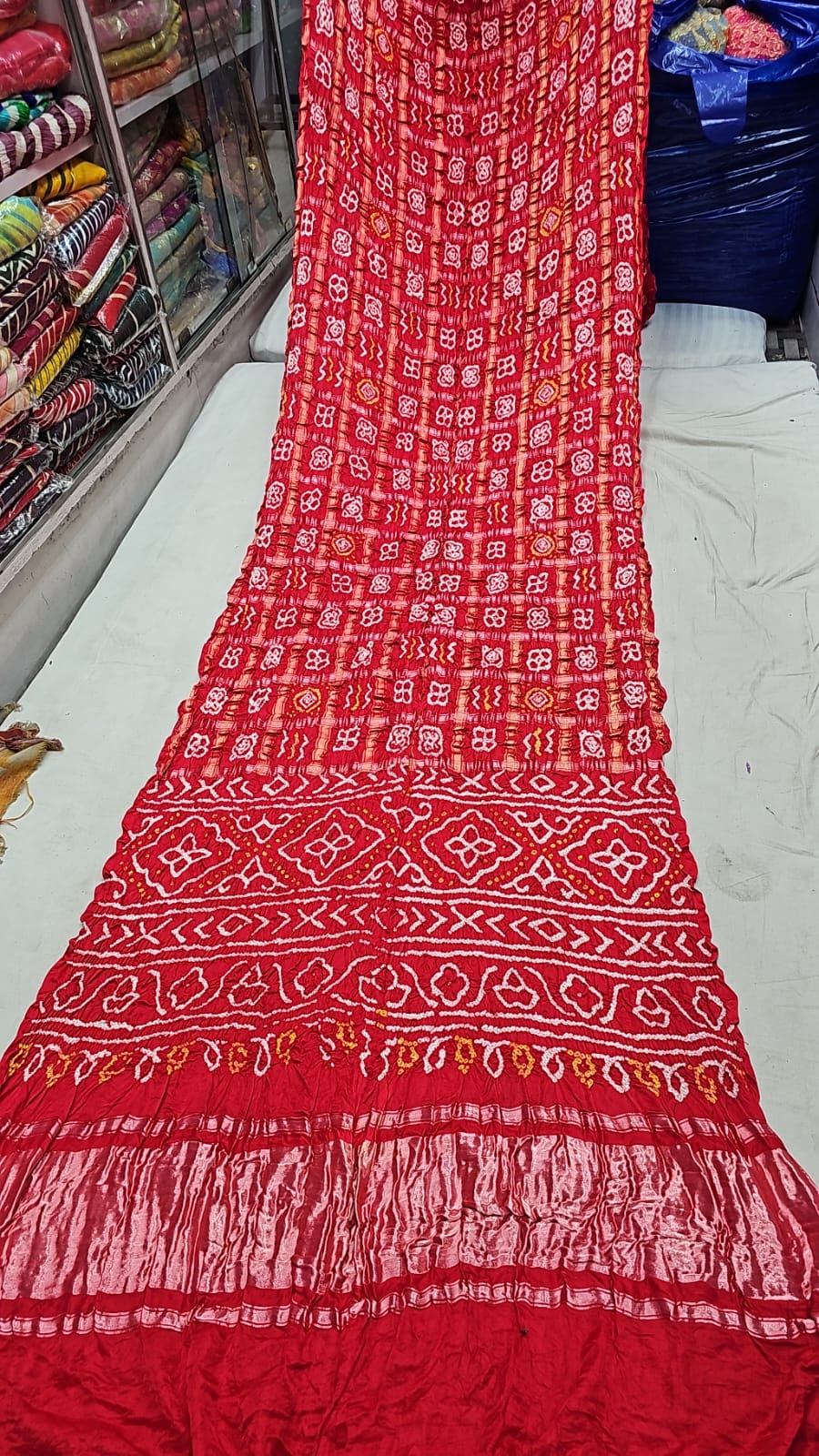 Gharchola Bandhej Saree in Gaji Silk in stunning shade of red